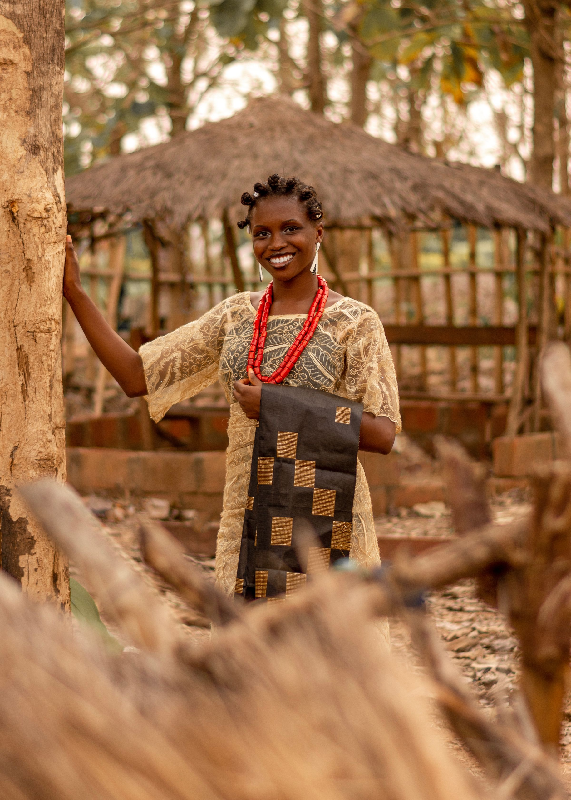Smiling Nigerian woman in traditional attire