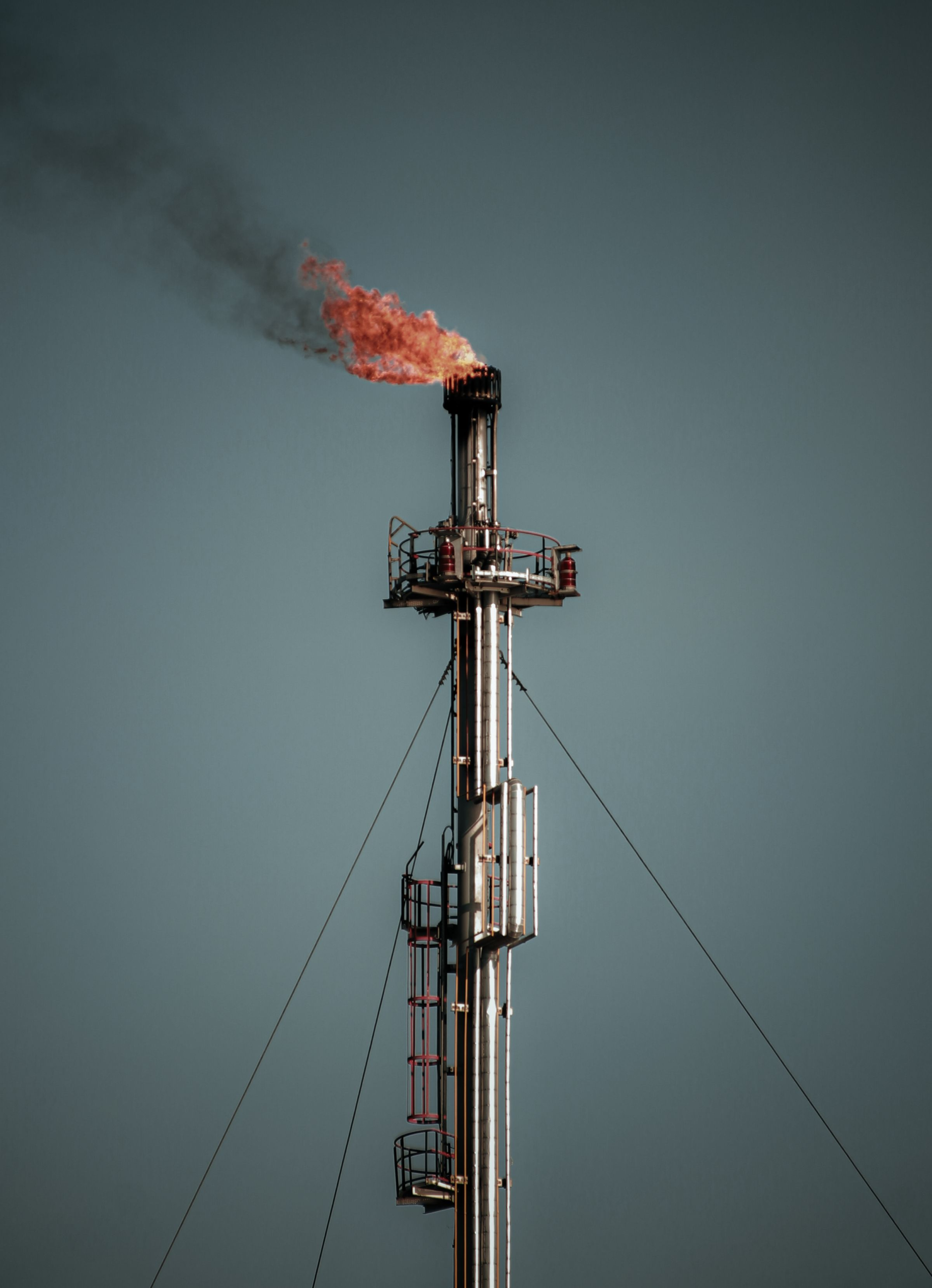 Gas flare stack against the sky