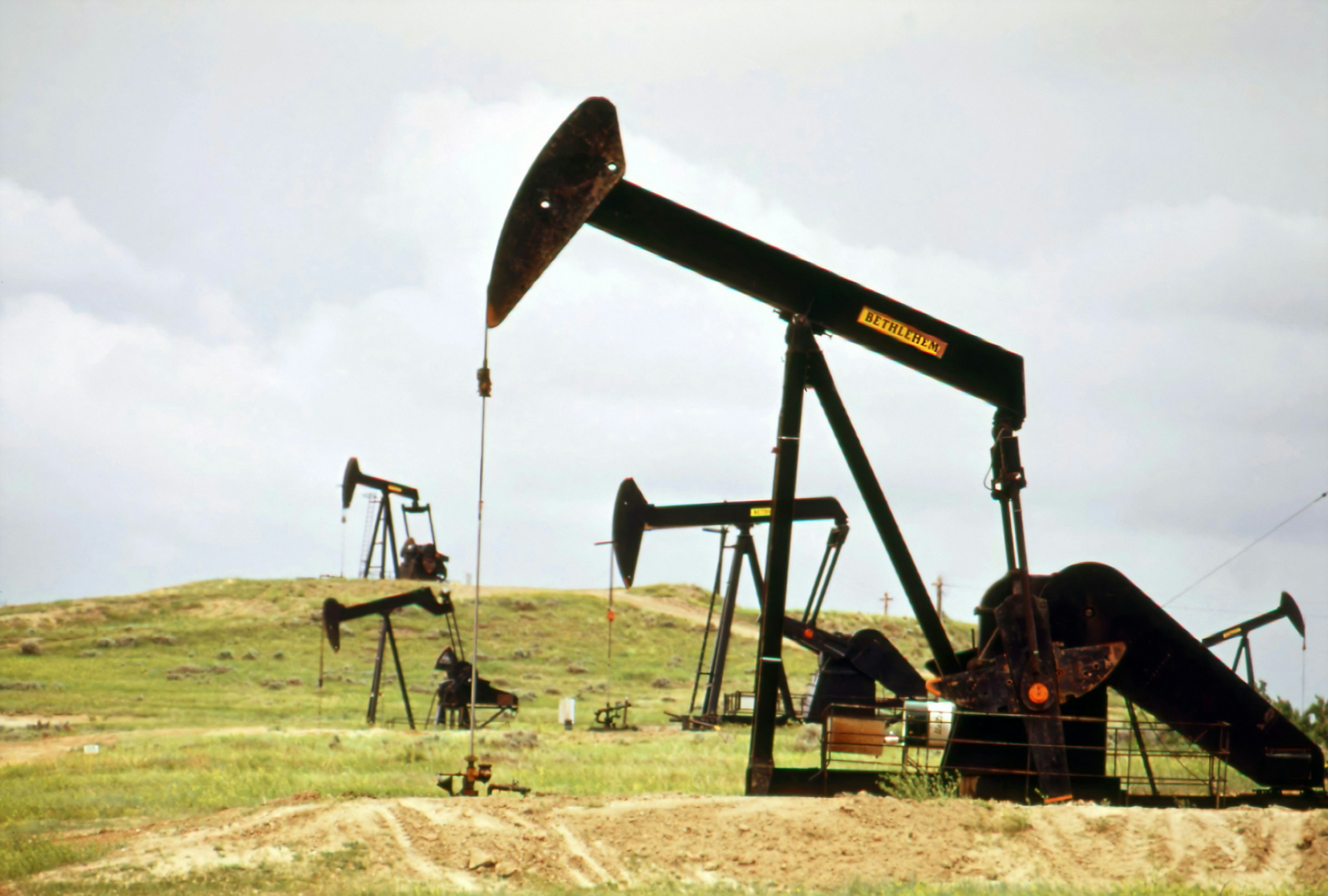 Oil pumpjacks on grassland
