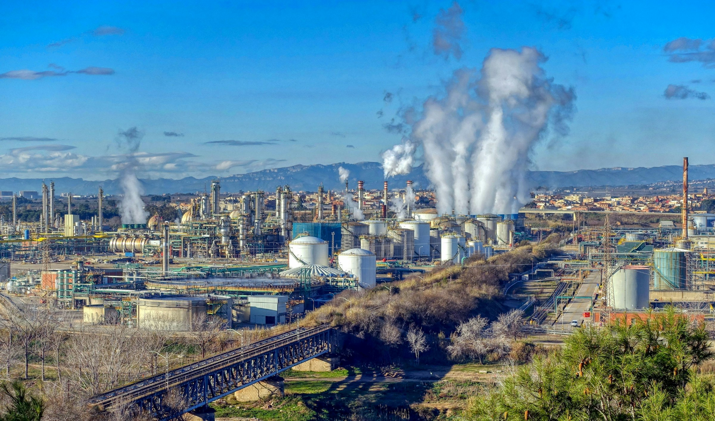 Aerial view of an industrial complex, illustrative